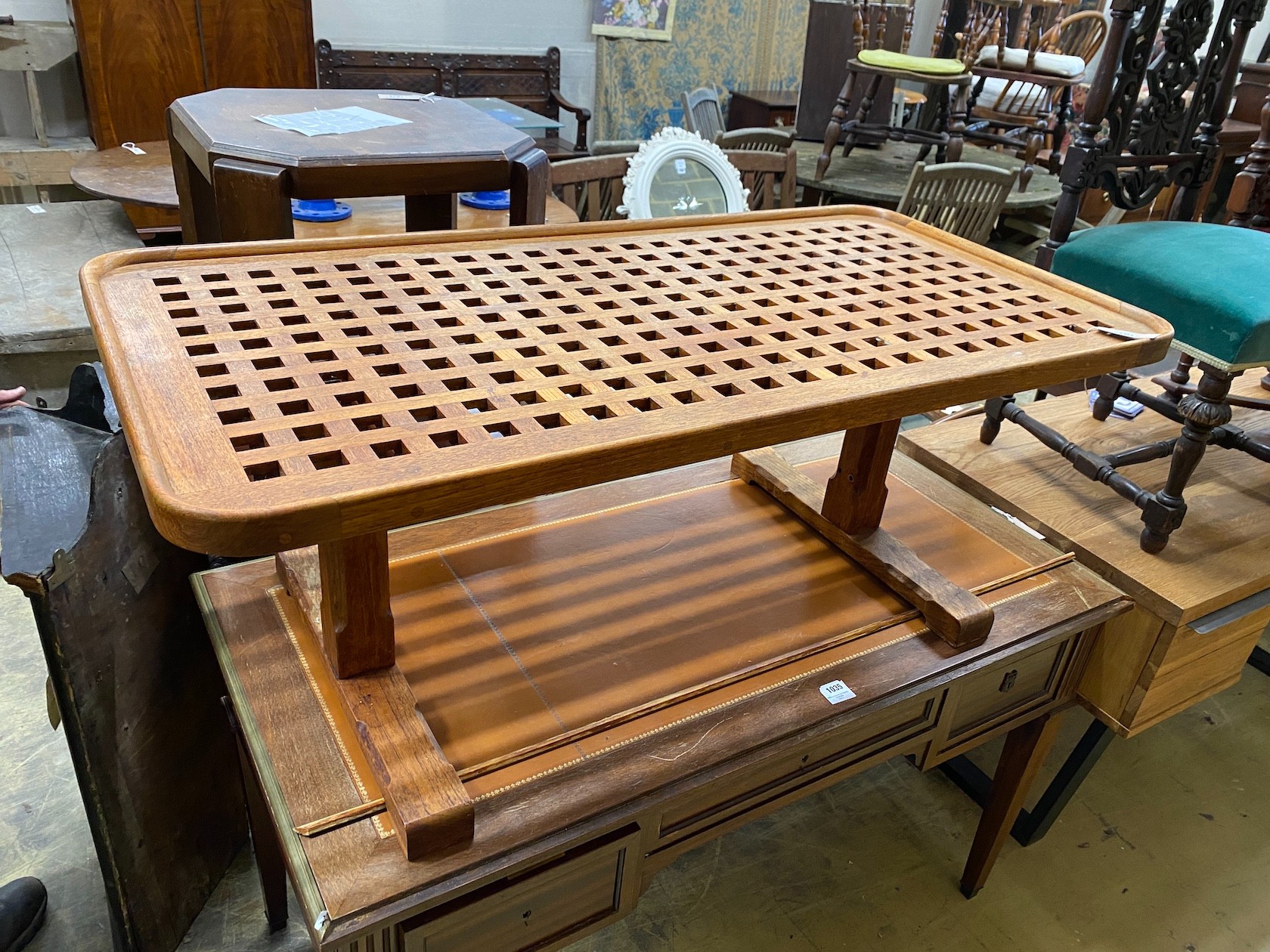 An Arts & Crafts style rectangular oak lattice top coffee table, length 123cm, width 62cm, height 47cm
